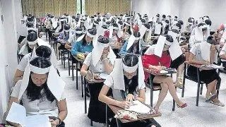 Cum sunt supravegheati la examene studentii chinezi?